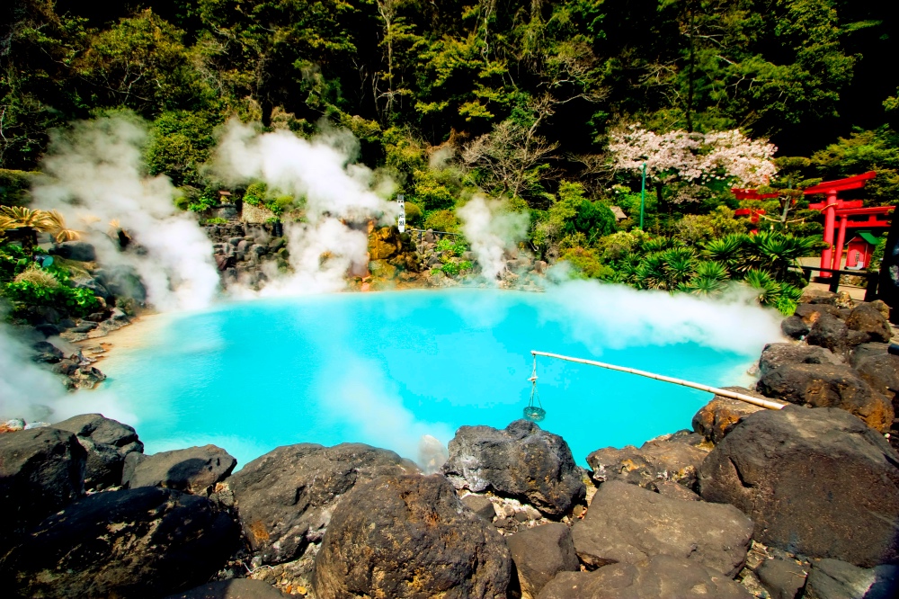 Oita Hotspring blue water and red torii gates