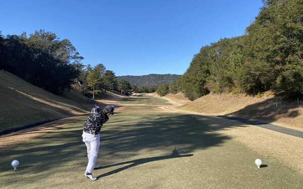 Playing golf at Kintetsu Kashikojima Country Club, Mie prefecture, Japan